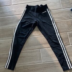 Adidas woman’s Black Leggings with White Stripes